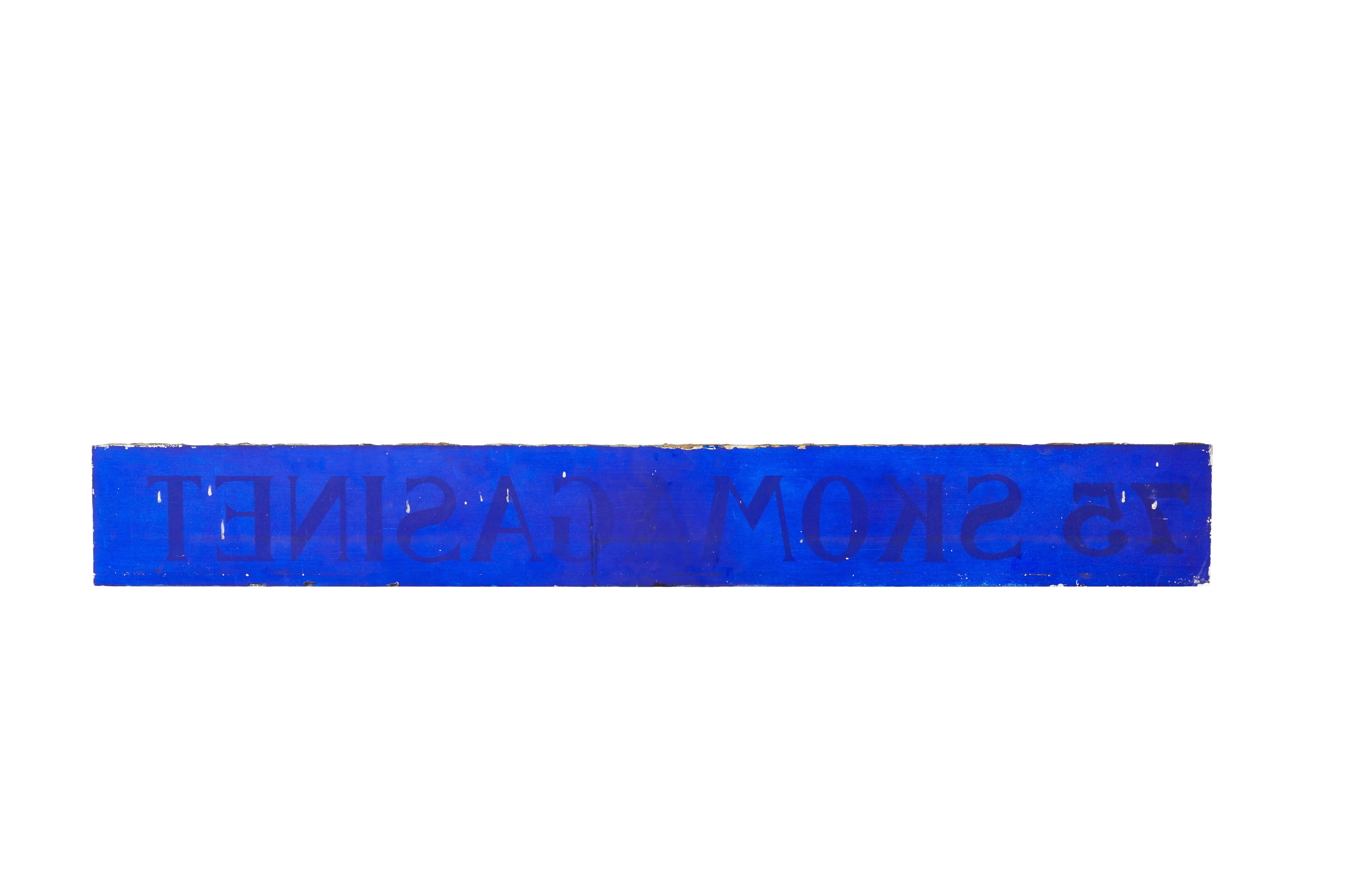 Scandinavian blue glass and gold boutique shoe shop sign circa 1900

Stunning piece of shop front signage from Sweden, gold bevelled effect lettering on blue background. Lovely decorative piece.

Would look stunning backlit or it could even be