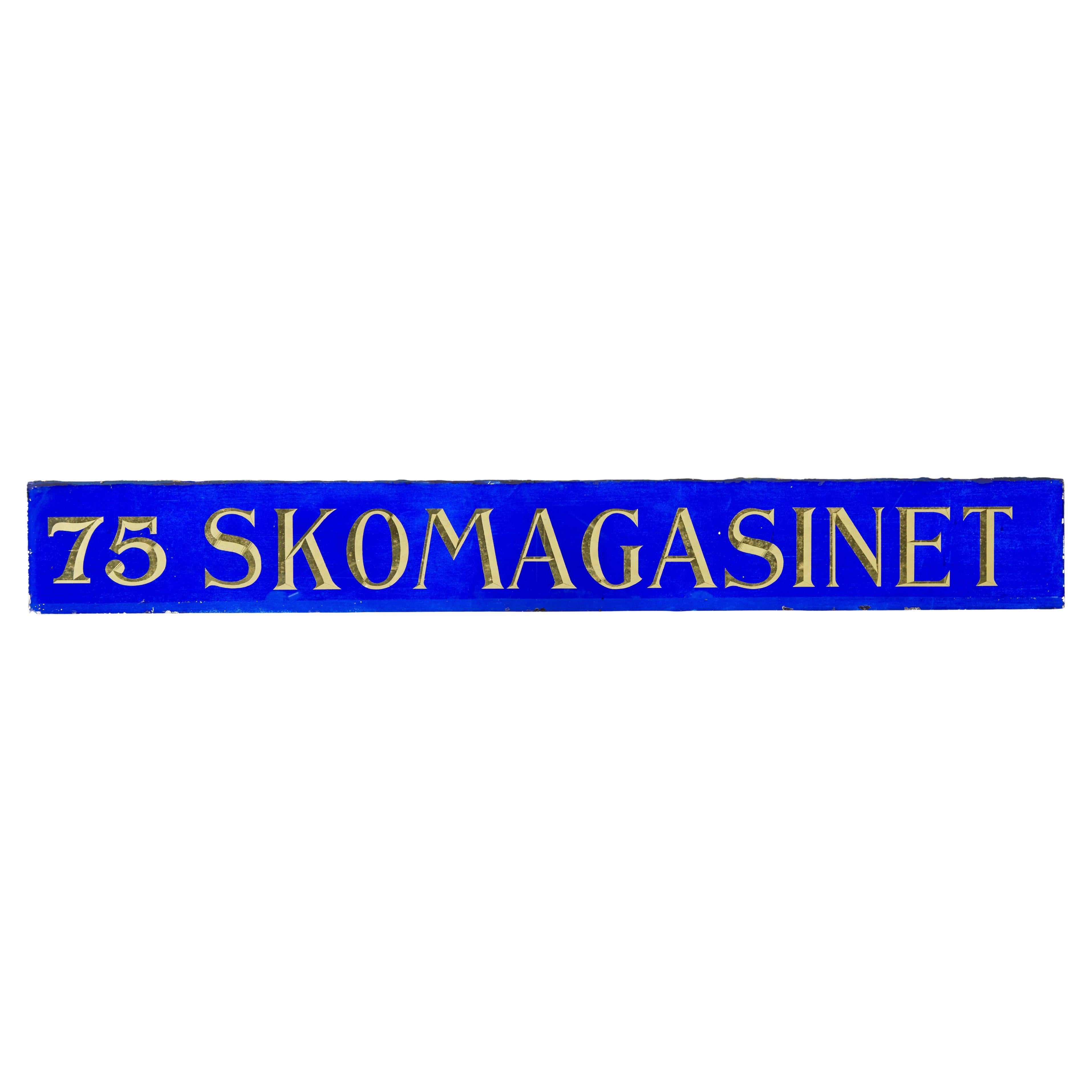 Scandinavian blue glass and gold boutique shoe shop sign