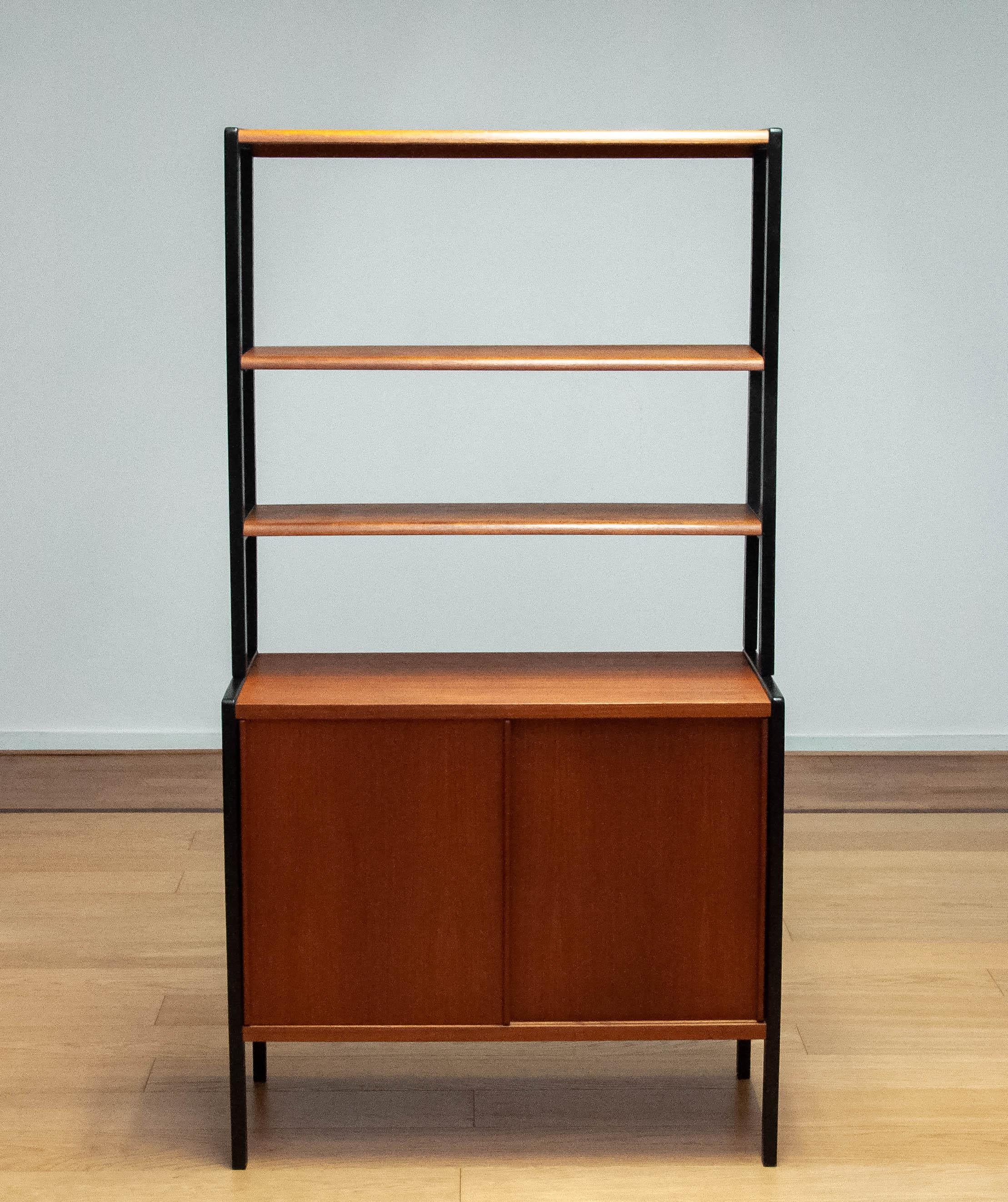 Scandinavian Bookcase In Teak With Black Lacquered Stands By Bertil Fridhagen  5