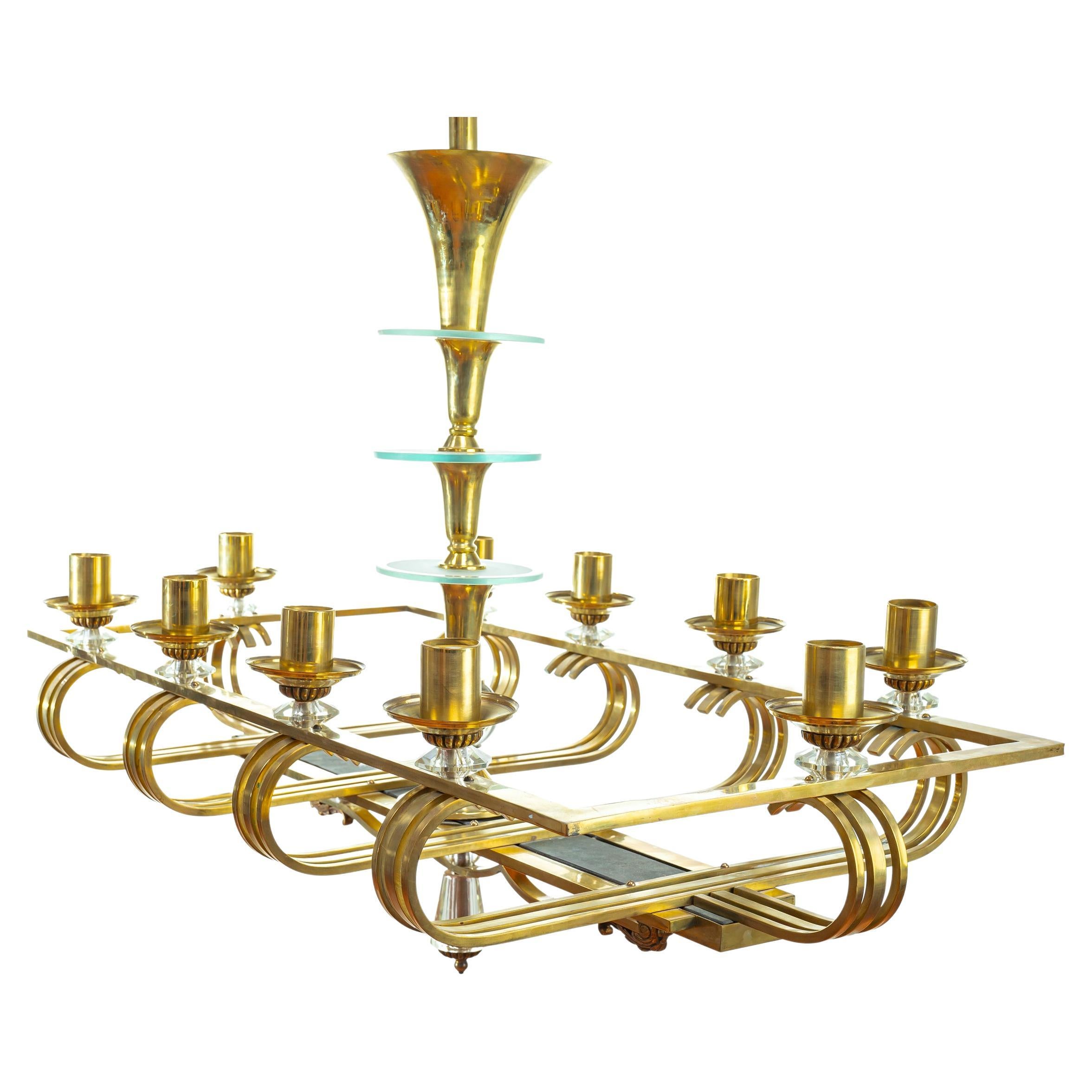 Spectacular Mid-20th century scandinavian pendant six-light chandelier. Rare model with brass frame and glass details. Paavo tynell style.

The light is in good condition, and the wires have been renewed. There is some wear consistent with age and