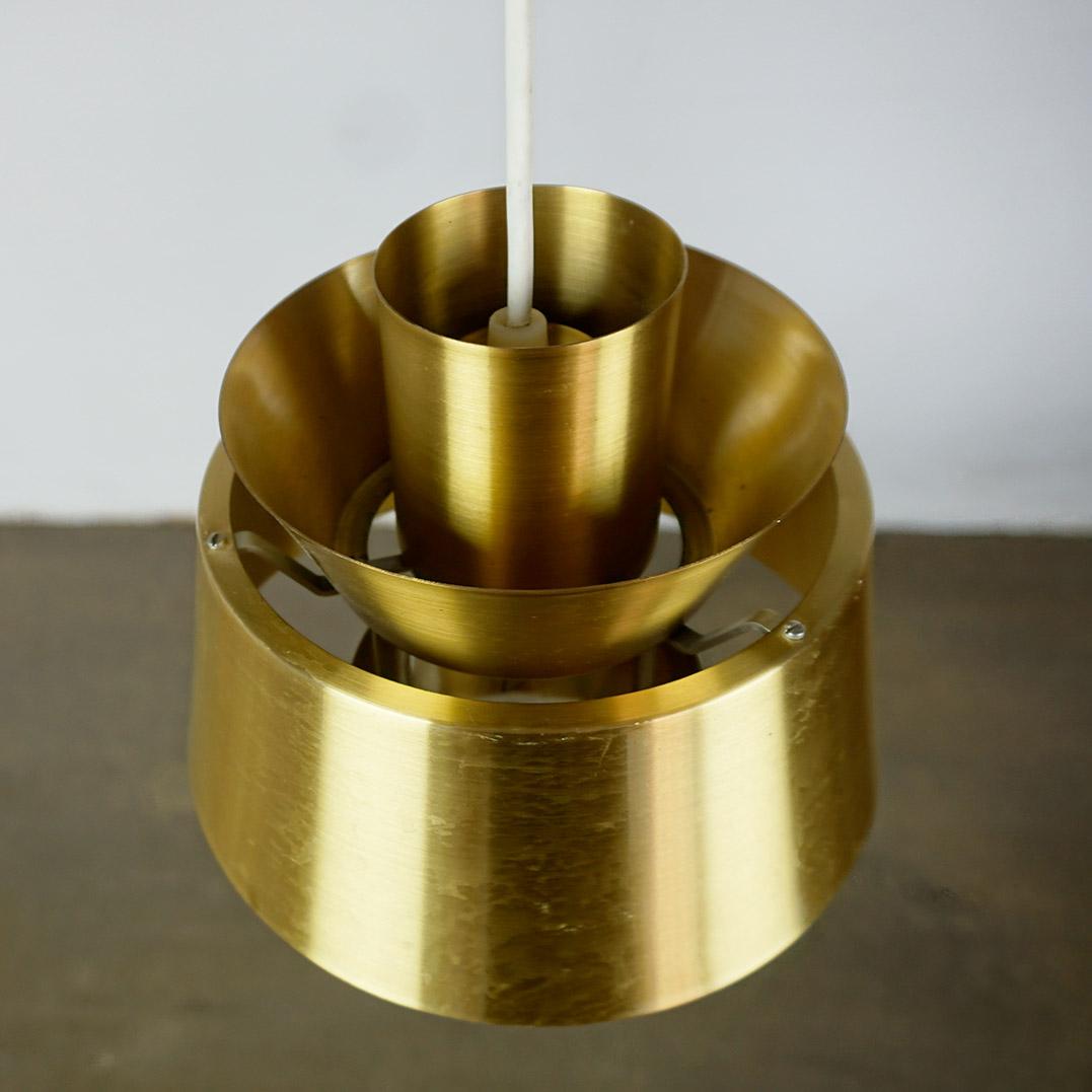 This scandinavian plated brass lamp was designed by Jorn Utzon, the Architect of the Sydney Opera House and was originally produced by Nordisk Solar under the name 