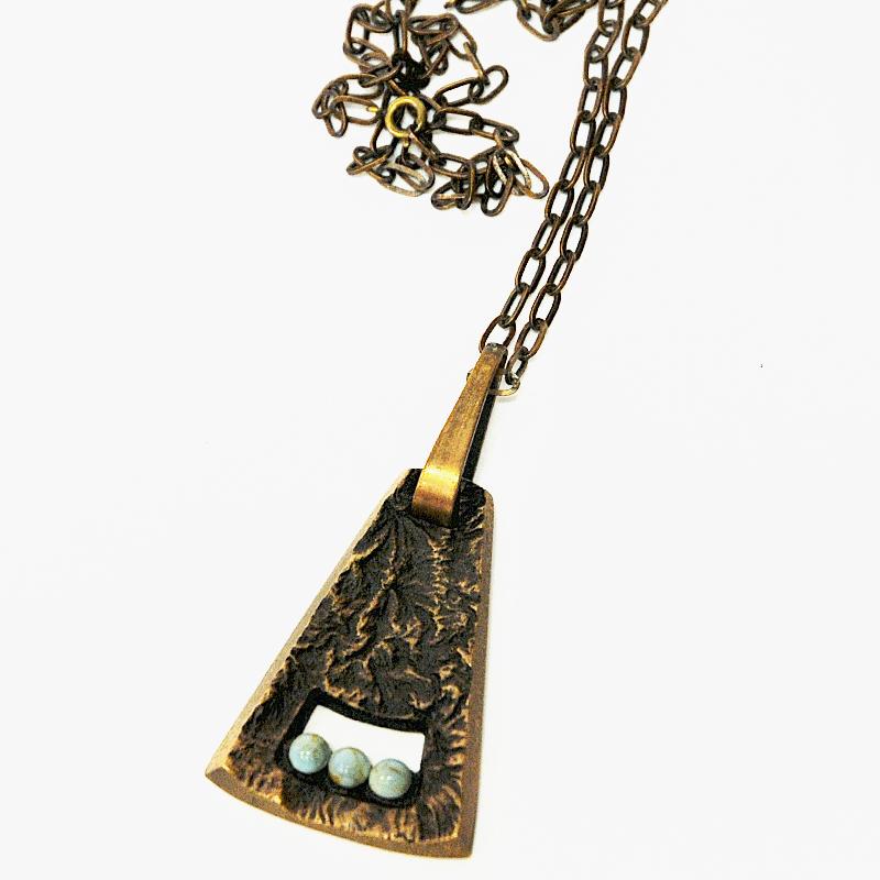 Modern Scandinavian bronze triangle shaped pendant with stones 1970s