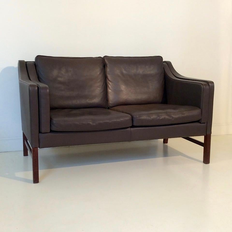 Nice Scandinavian brown leather sofa, 2-seats.
Original leather upholstery, wood feet.
Dimensions: H 82 cm, seat height 42 cm, W 138 cm, D 75 cm.
Good original condition.
We ship worldwide.
