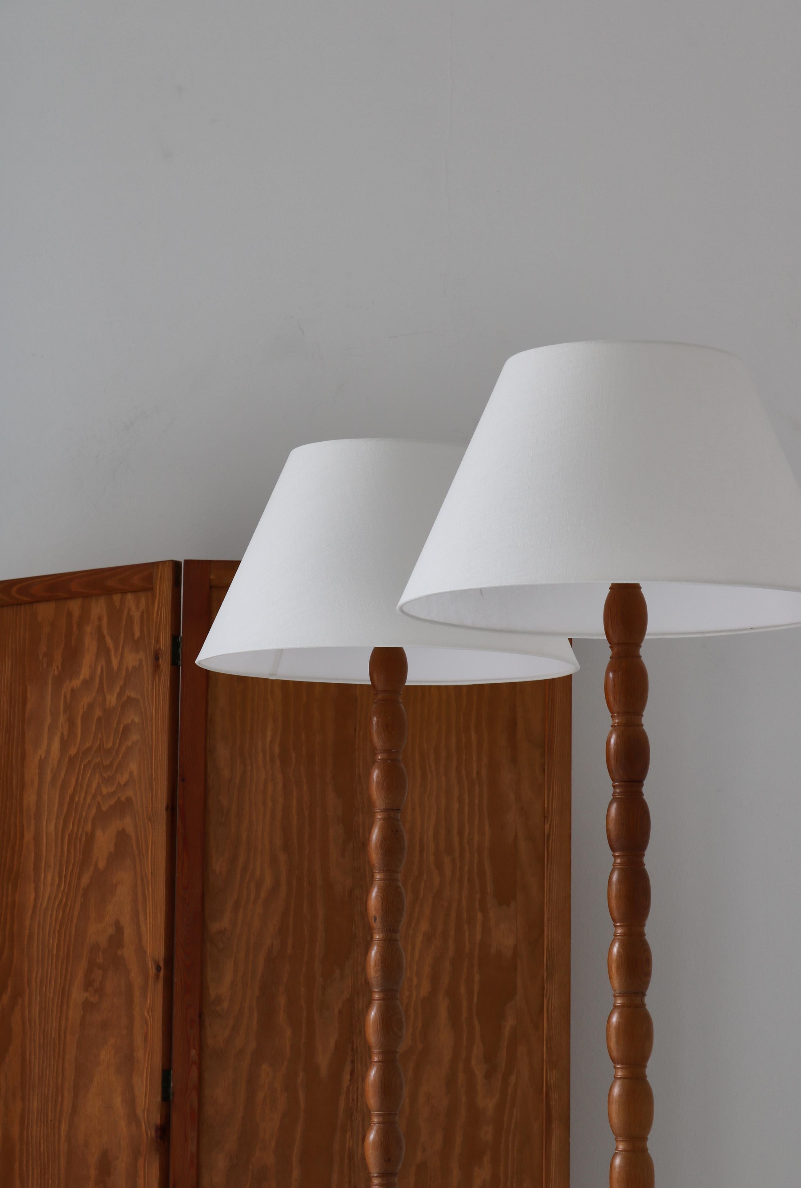 turned wood floor lamp