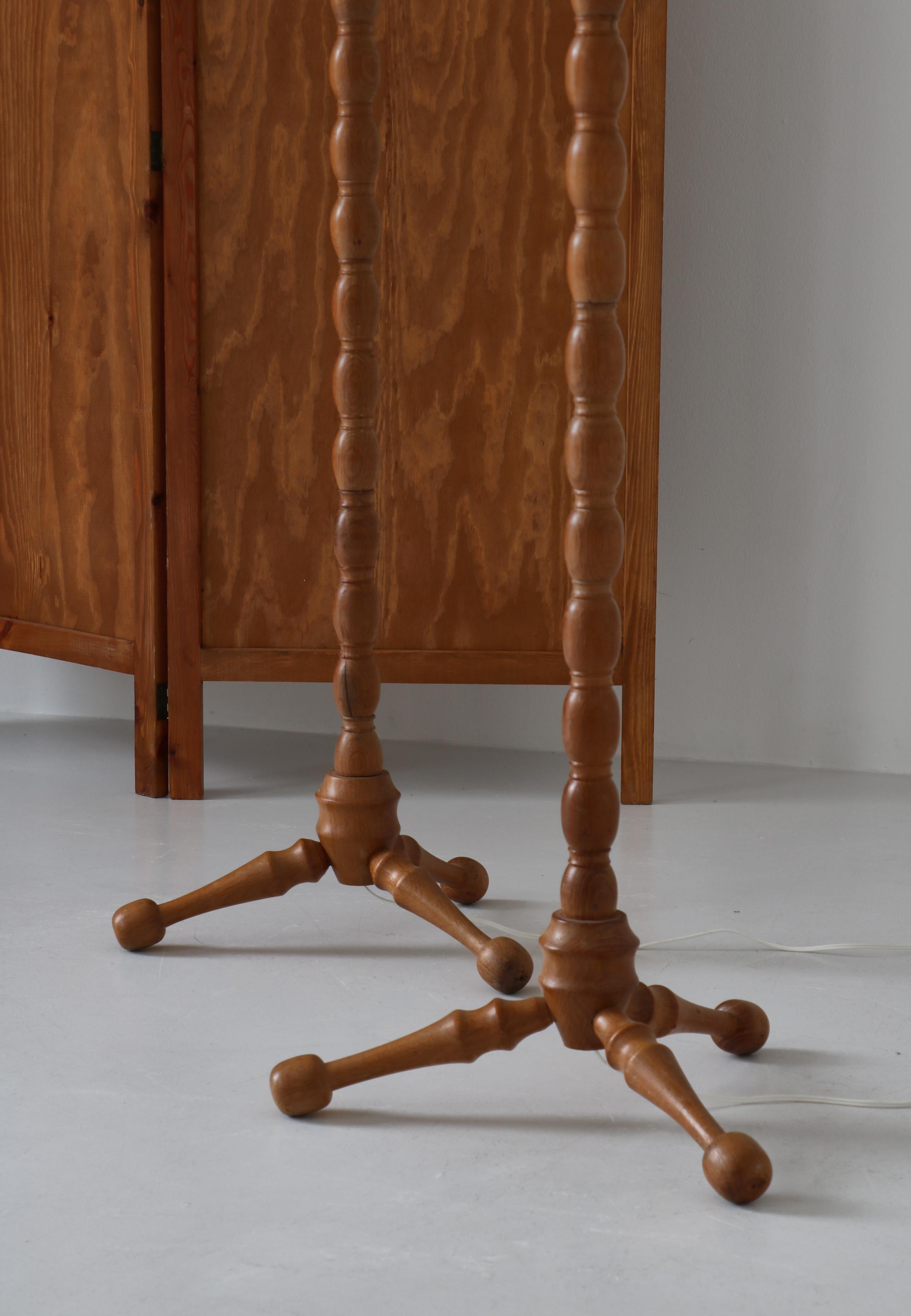 turned wooden floor lamp