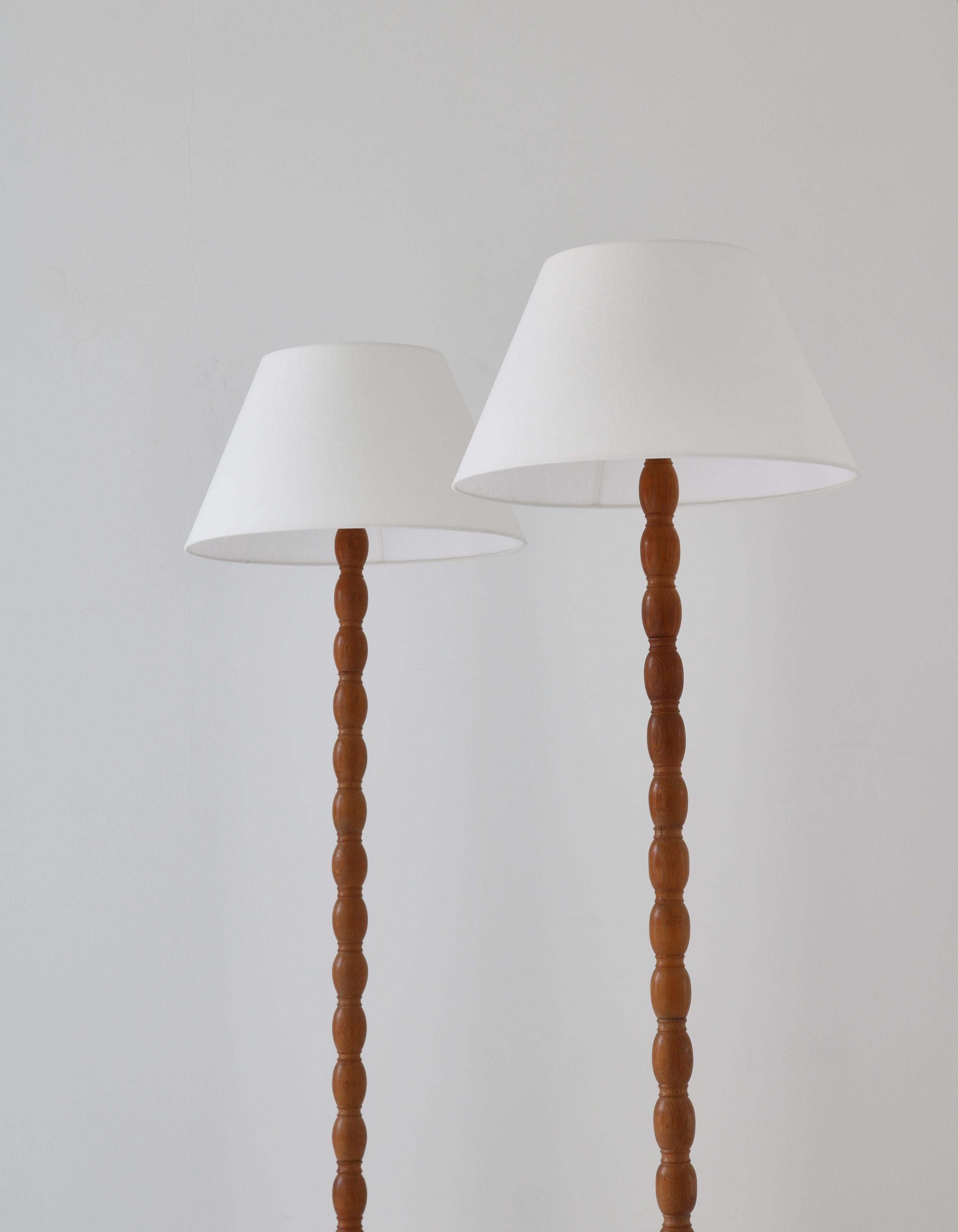 Danish Scandinavian Cabinetmaker Floor Lamps in Turned Oakwood, 1950s For Sale