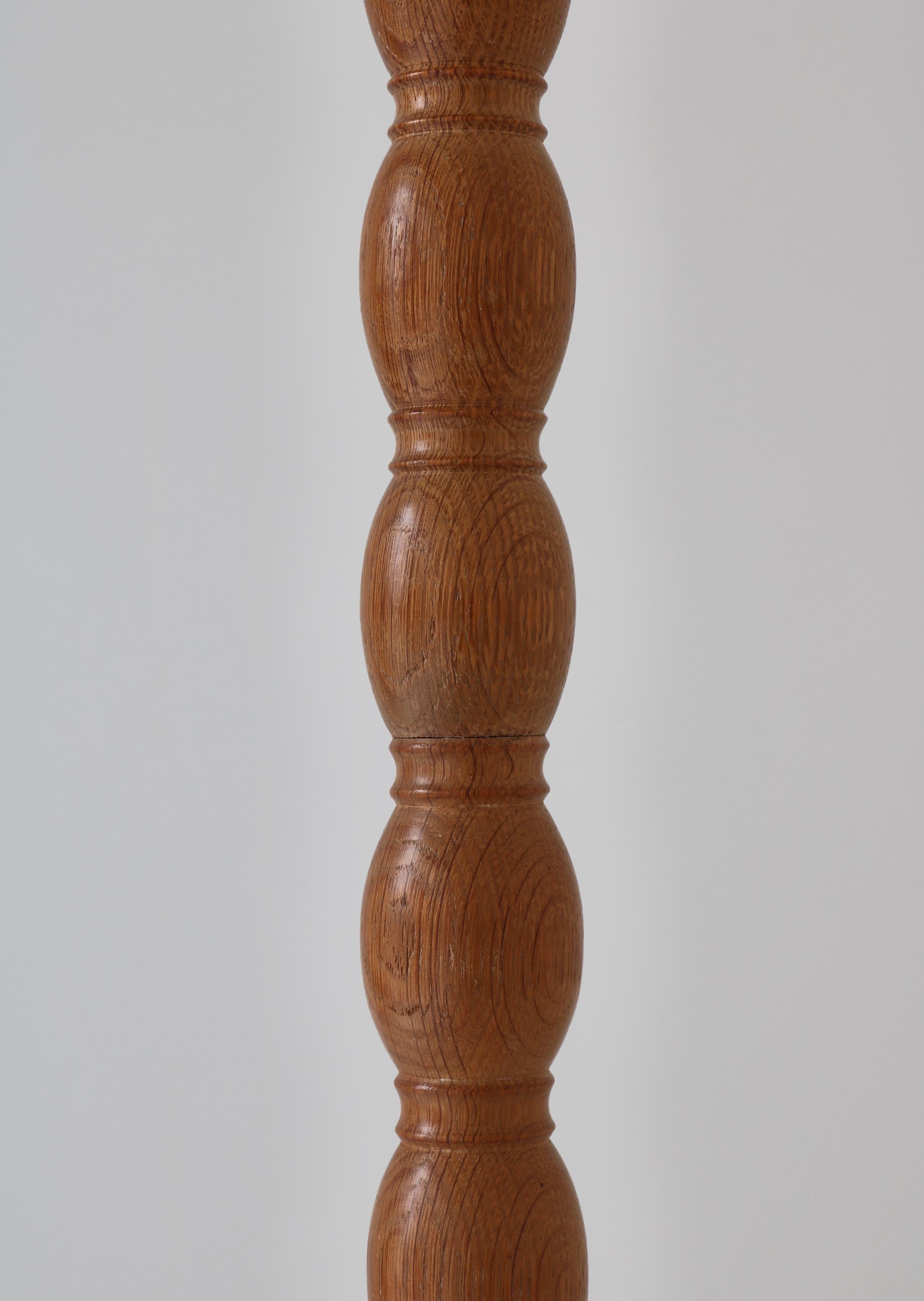 Mid-20th Century Scandinavian Cabinetmaker Floor Lamps in Turned Oakwood, 1950s For Sale