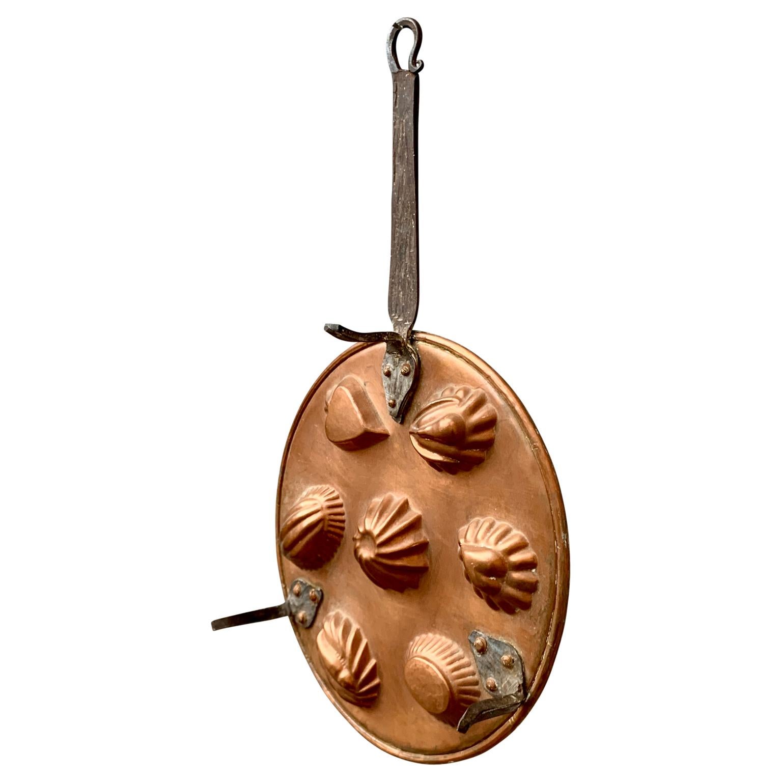 A Scandinavian end of 18th Century/beginning of the 19th Century cake copper mold. The handle and the 