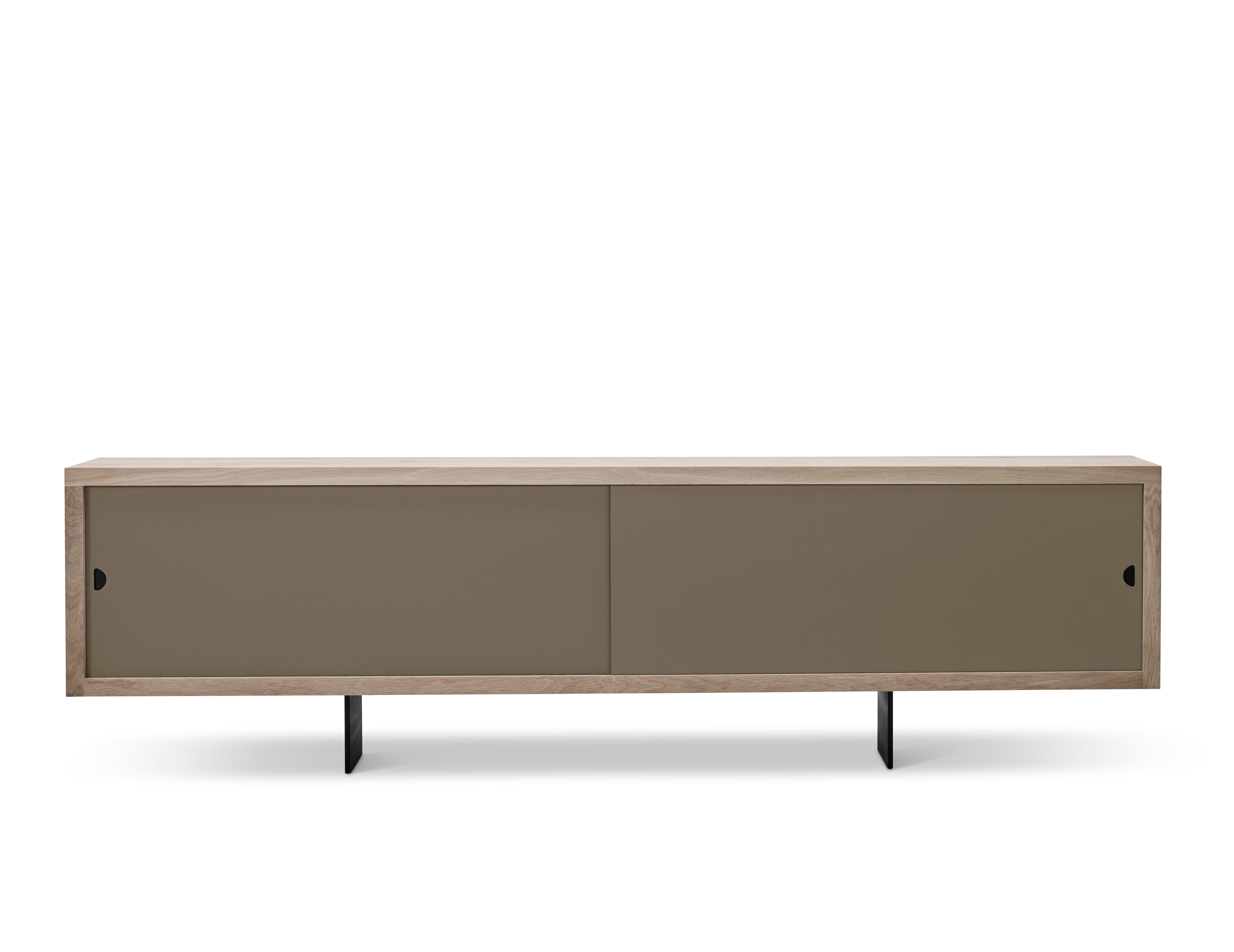 GRAND Sideboard by Jacob Plejdrup for DK3, 2016

Sideboard with sliding doors, available in castoro, beige, black or white.
Model in the picture: Castoro
Dimensions: H 68 x 50 x 200

---
dk3 is known for the large plank tables, so it was