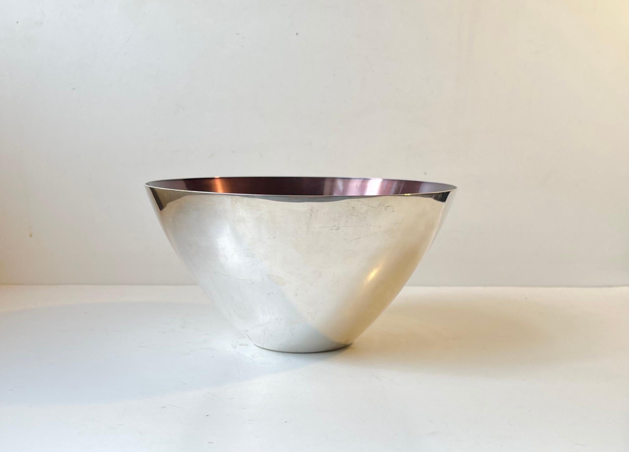 Large conical silver plate bowl decorated to the interior with a deep aubergine purple enamel. Manufactured and designed in Denmark during the late 1950s by DGS (Danish Silver- & Goldsmith association). Reminiscent in design to similar bowls by
