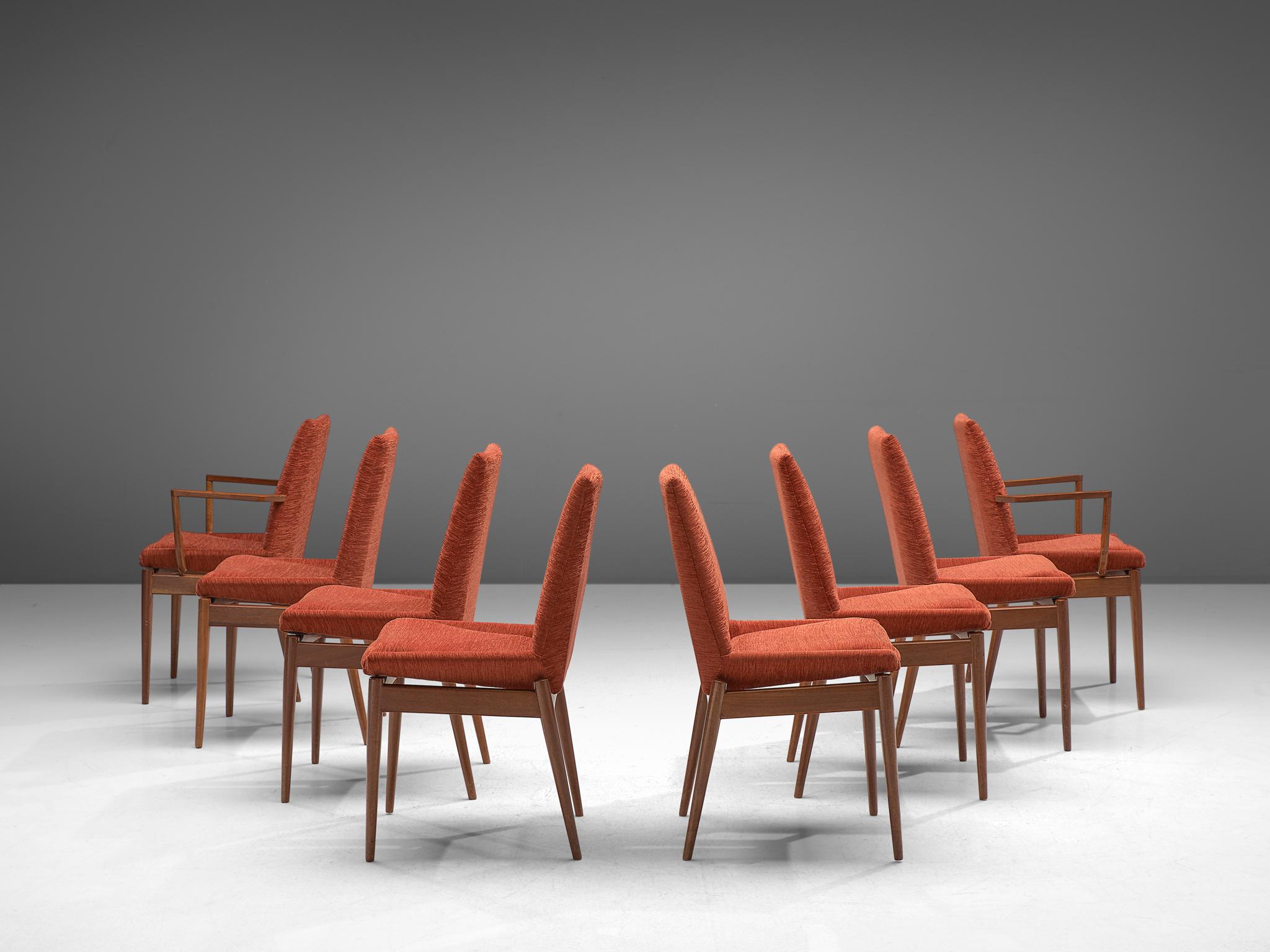 Set of 8 dining chairs, teak, red orange corduroy, Scandinavia, circa 1955.

The set of eight chairs is sensuous, sculptural and elegant. Two chairs dramatically high and sculpted armrests, while six have no armrests. The design features a high,