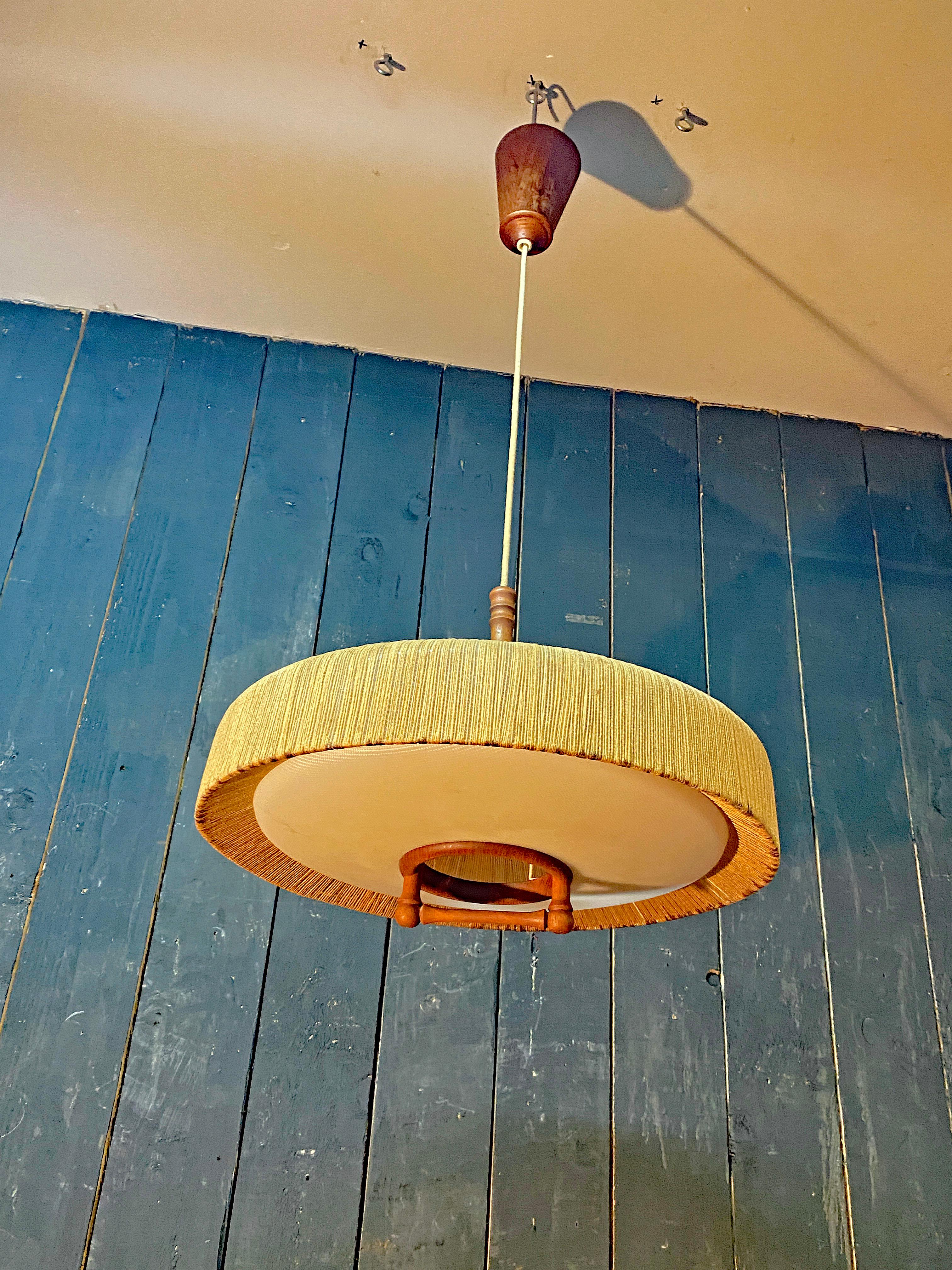Scandinavian chandelier, rises and falls, in teak and rope circa 1960  For Sale 5