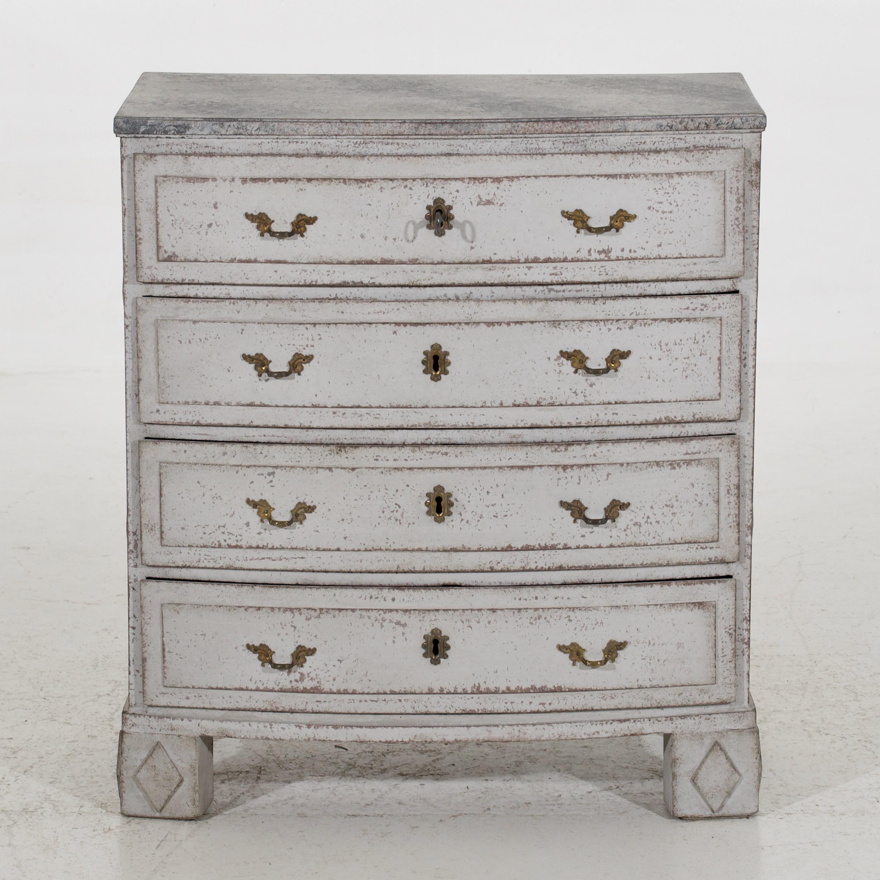 This stunning Scandinavian chest features a curved front, faux marble painted top and original locks, dating back to 1810.