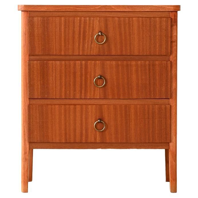 Scandinavian chest of drawers with three drawers and metal details