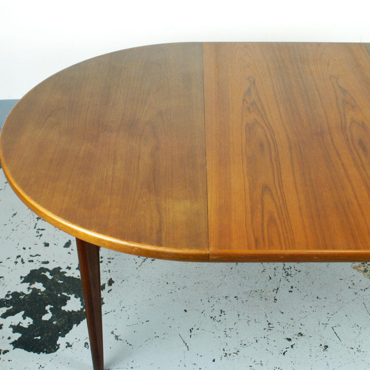 Scandinavian Circular Teak Dining Table with Two Extensions by  Niels Koefoeds 1