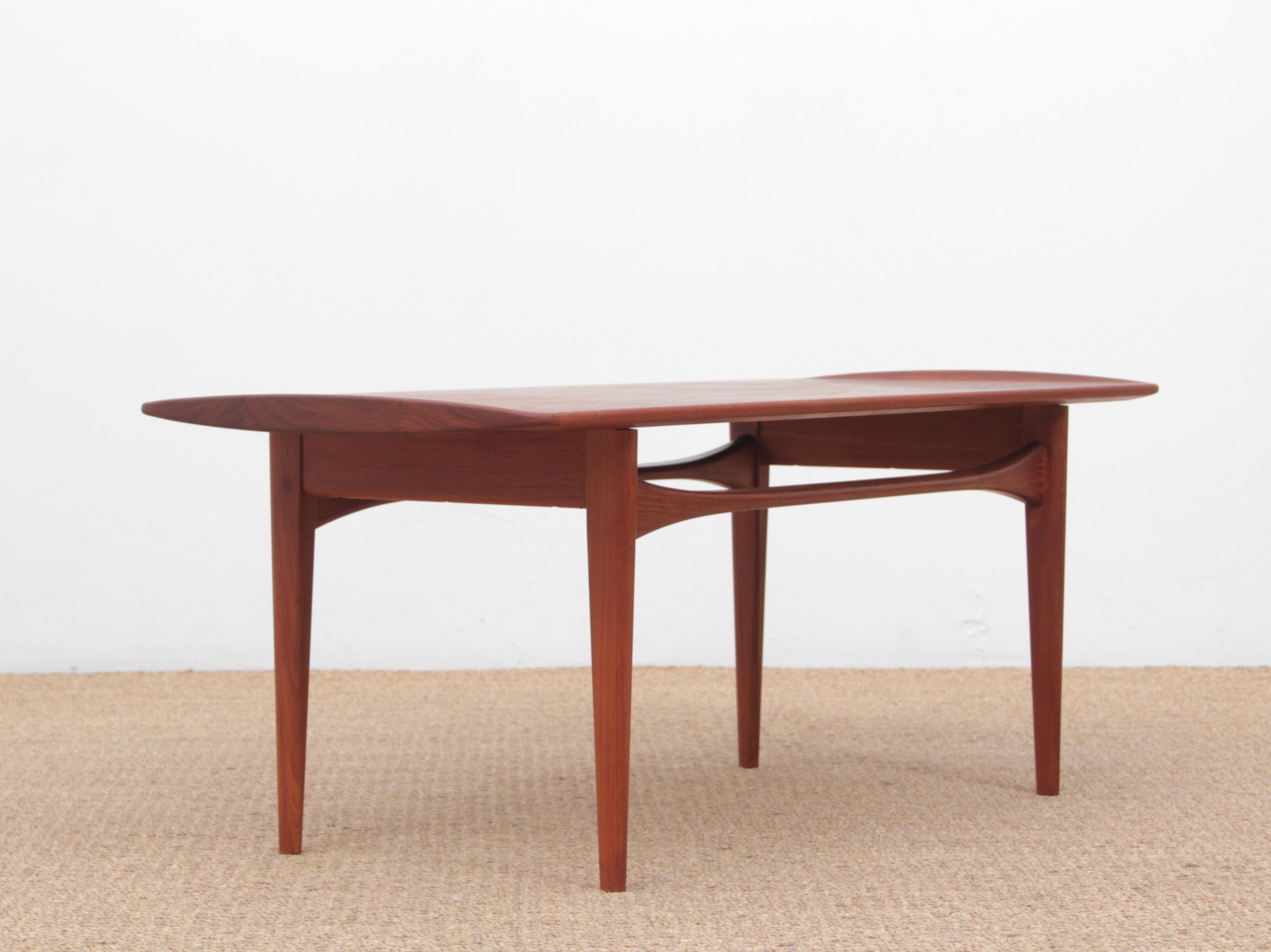 Scandinavian coffee table in teak designed by Kindt-larsen for France and Daverkosen. First edition from 1955, solid teak top. Referenced by the Design Museum Denmark under number RP00835. Bibliography : France & Daverkosen catalog 1956/57, The