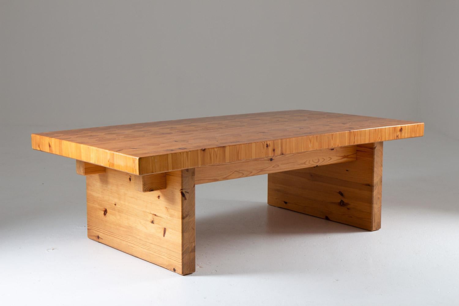 Rare coffee table in pine, most likely manufactured in Sweden, circa 1970.
This table is a great example of the robust pine furniture era that grew popular in Sweden in the late 1960s. The table is made of thick solid pine with a loose tabletop in