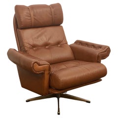 Sedia girevole scandinava in pelle cognac