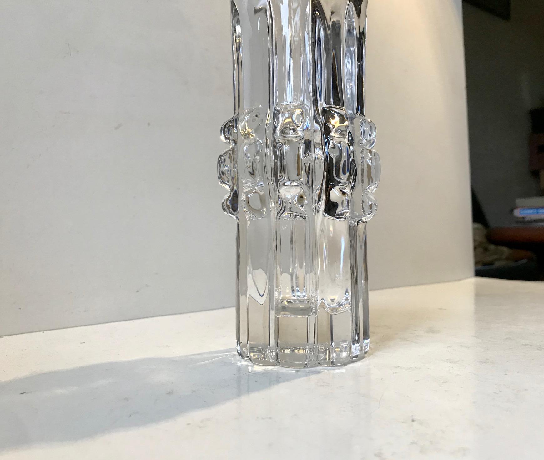 A sculptural crystal vase designed by Bengt Edenfalk and manufactured by Royal Krona in Skruf Sweden during the 1970s. It is signed by the designer in hand to the base and features the crest mark of Royal Krona.