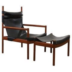 Scandinavian Danish black leather Safari sling lounge chair with ottoman