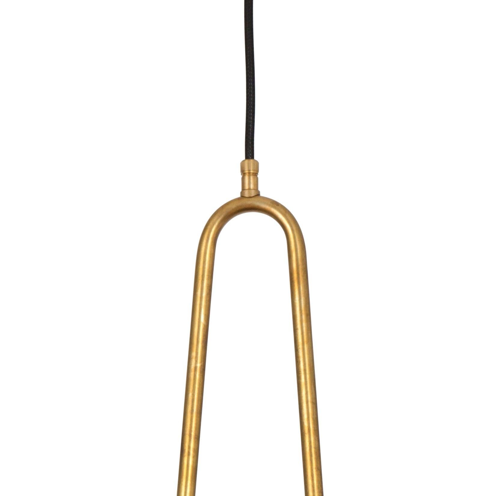 Add a touch of Scandinavian elegance to your home with this stunning ceiling lamp by Konsthantverk. Designed by Johan Carpner, the Satellit 55 model features a sleek black mat and raw brass finish. Crafted using traditional techniques, this lamp is