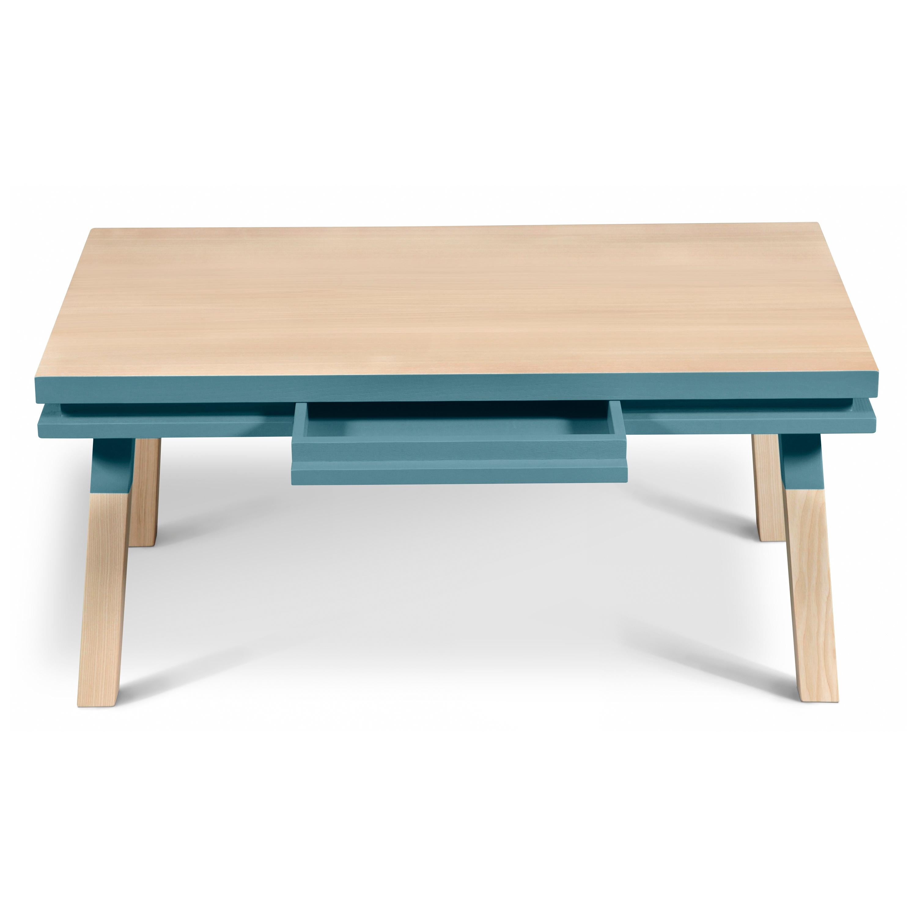 Rectangular coffee table made of 100% solid ash wood from sustainably managed French Forests

1 wooden drawer is integrated into the belt

This piece of furniture is part of the ÉGÉE collection, designed by the Parisian designer Eric GIZARD who