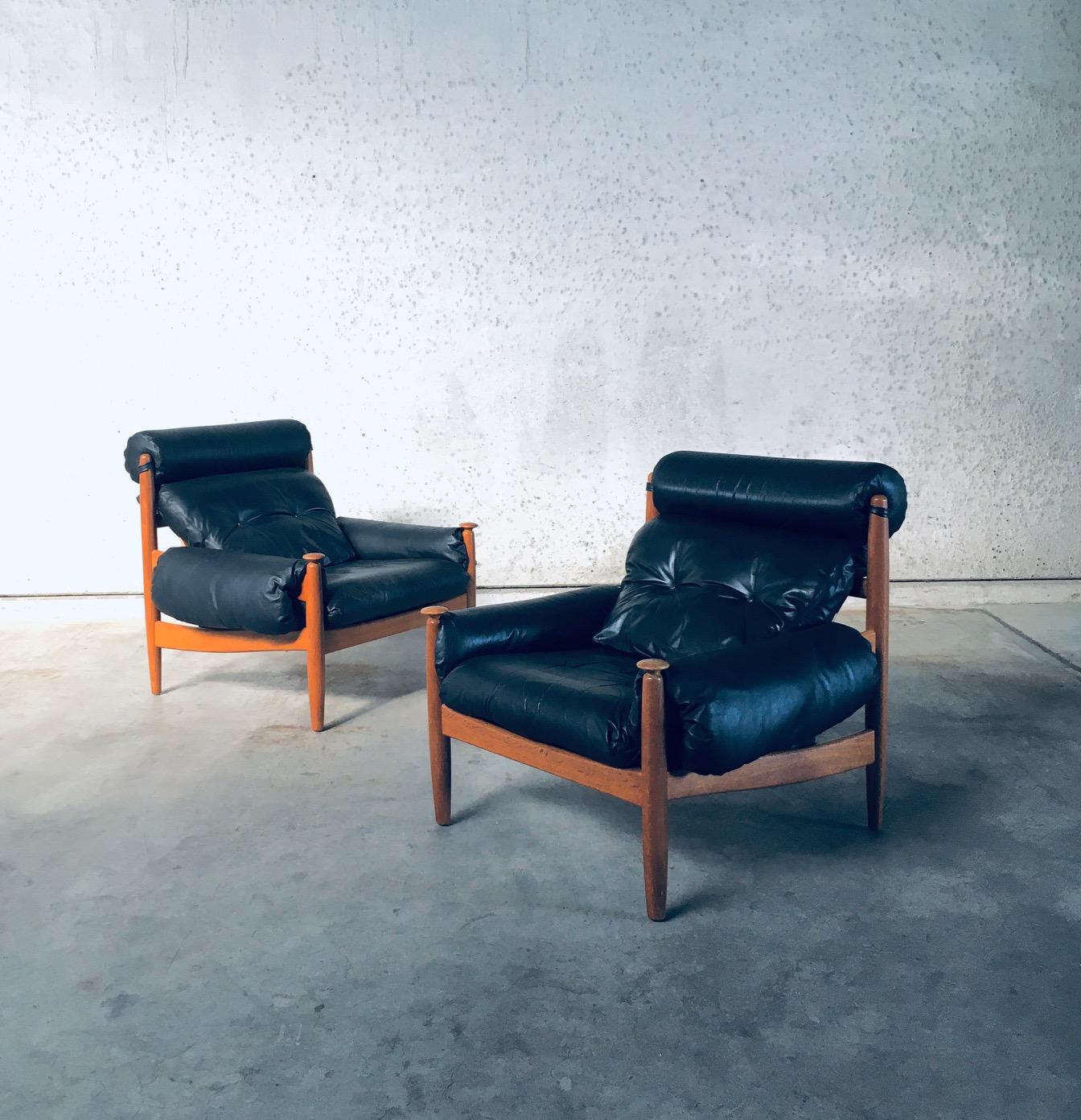 Vintage Midcentury Modern Scandinavian Design Lounge Chair set by Eric Merthen for Ire Möbler. Made in Sweden, 1960's period. Teak wood frame with black leather cushions. These come in very good, all original condition. Very well made, large and