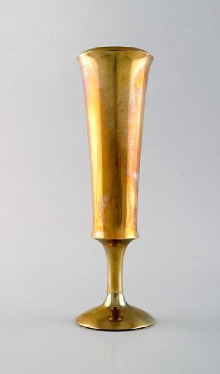 Scandinavian design. Three vases in brass. 1960's.
In very good condition.
Measures: 21 x 6.5 cm.