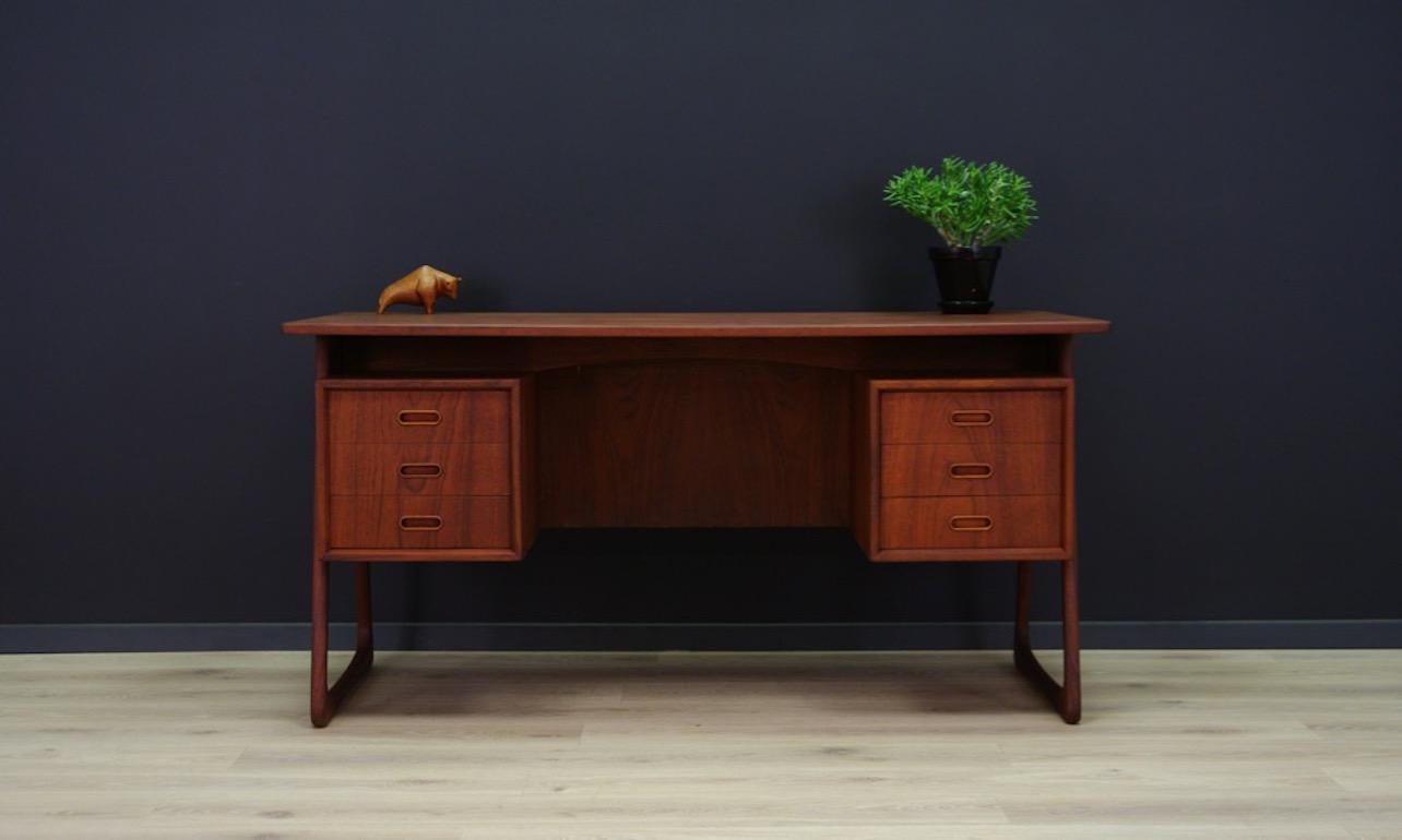 Unique desk from the 1960s-1970s, Danish design, Minimalist form finished with teak veneer. A practical front with six drawers, a large book shelf at the back. Preserved in good condition (small dings and scratches) - directly for