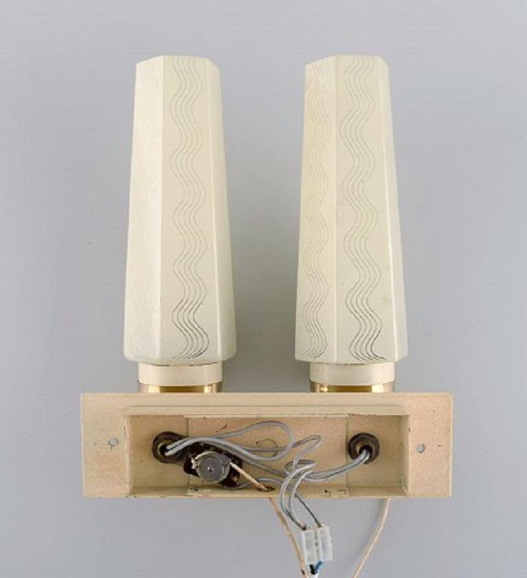 Scandinavian Designer, a Pair of Double Brass Wall Lamps with Glass Shades For Sale 4