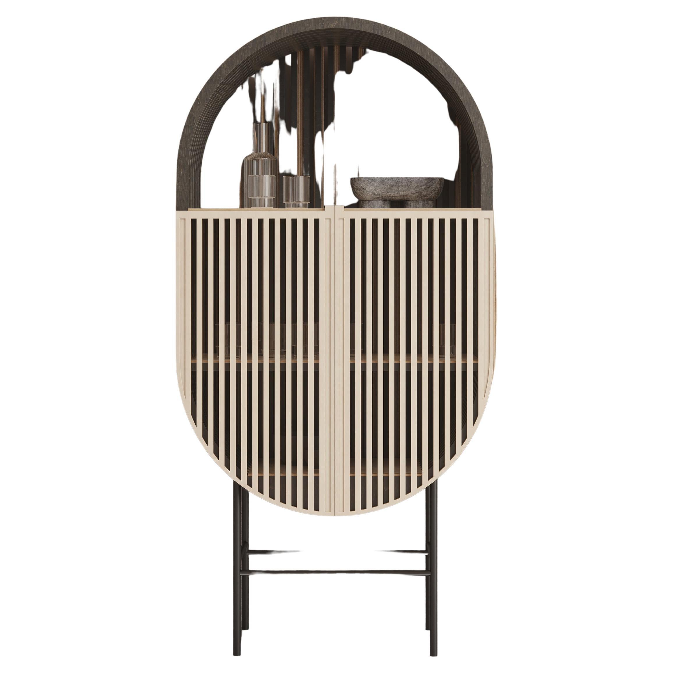 This Bar Cabinet pays tribute to the National Spirit of Scandinavia. 
Elegant piece through the characteristic wooden slats, the creased lines and the smooth architectural design. All in perfect harmony with the necessary functionalities of a bar