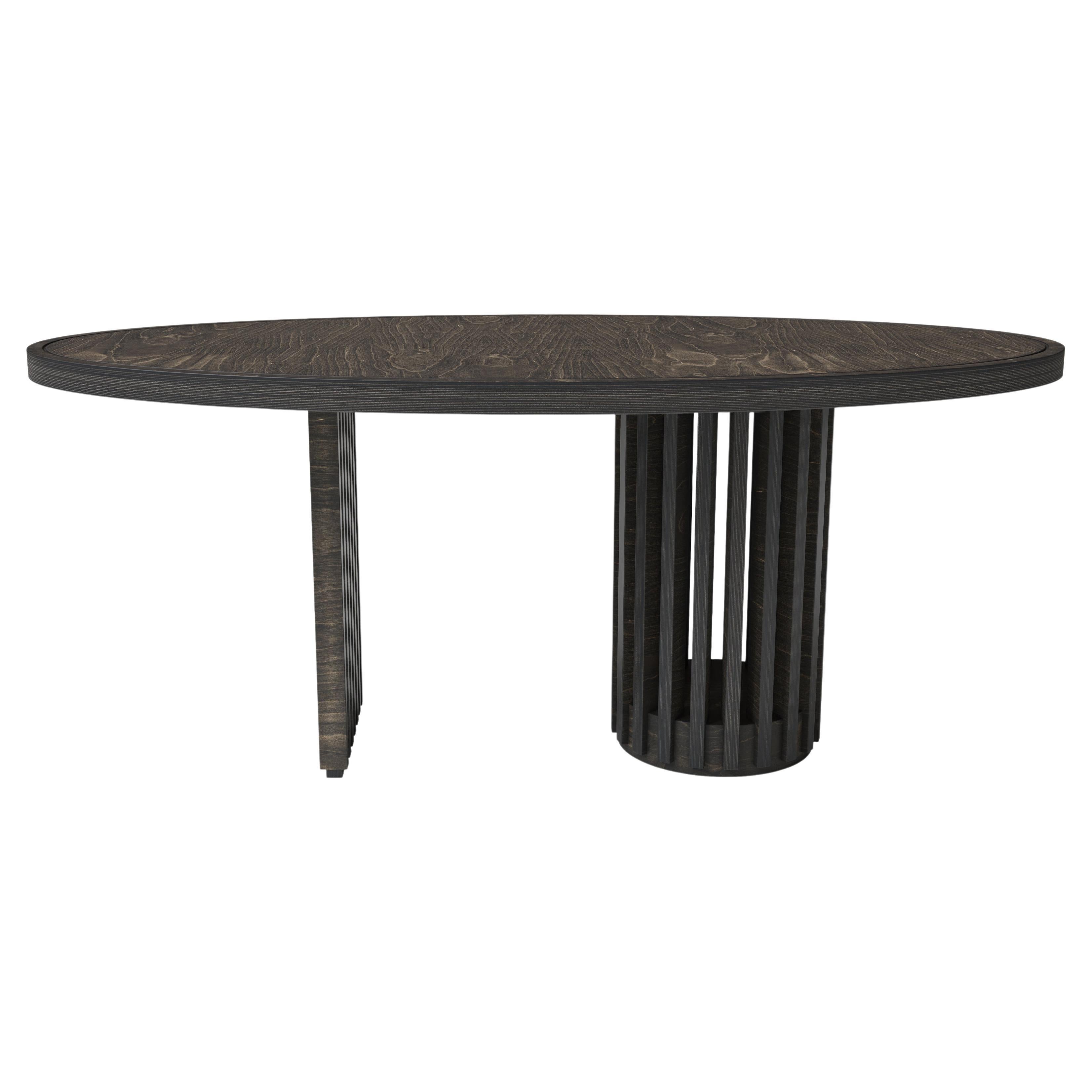 This dining table combines the smooth top oval shape with wooden slats on the asymmetrical feet. It’s minimalistic elegance contrasts with the robust materials inspired in the Nordic design.
A functional and iconic table that makes a great addition