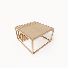 Table basse en bois taillé naturel de designer scandinave