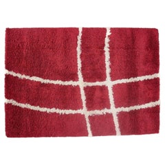 Scandinavian designer. Rya carpet in cotton in red and white tones.