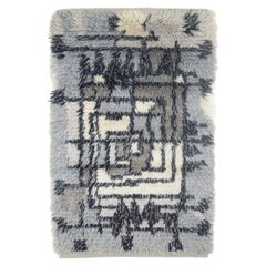 Scandinavian designer. Rya carpet in wool in black, grey, and cream tones.