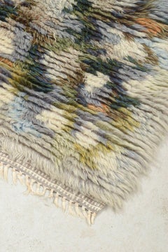Scandinavian designer. Rya carpet in wool with abstract design. 1960s/70s