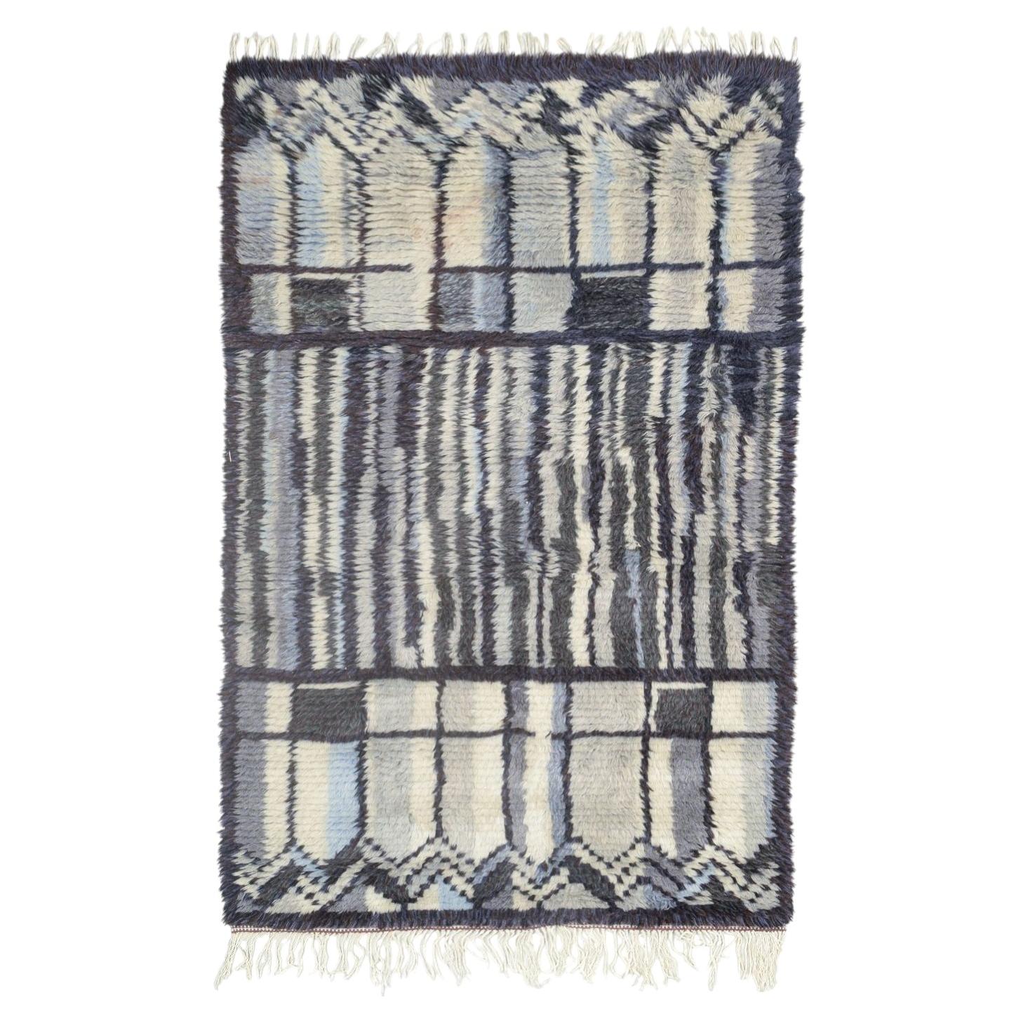 Scandinavian designer. Rya carpet in wool with graphic pattern, 1960s/70s