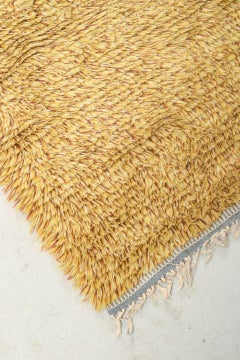 Scandinavian designer. Rya runner in pure wool in a golden mustard shade.