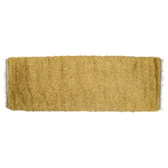 Scandinavian designer. Rya runner in pure wool in a golden mustard shade.