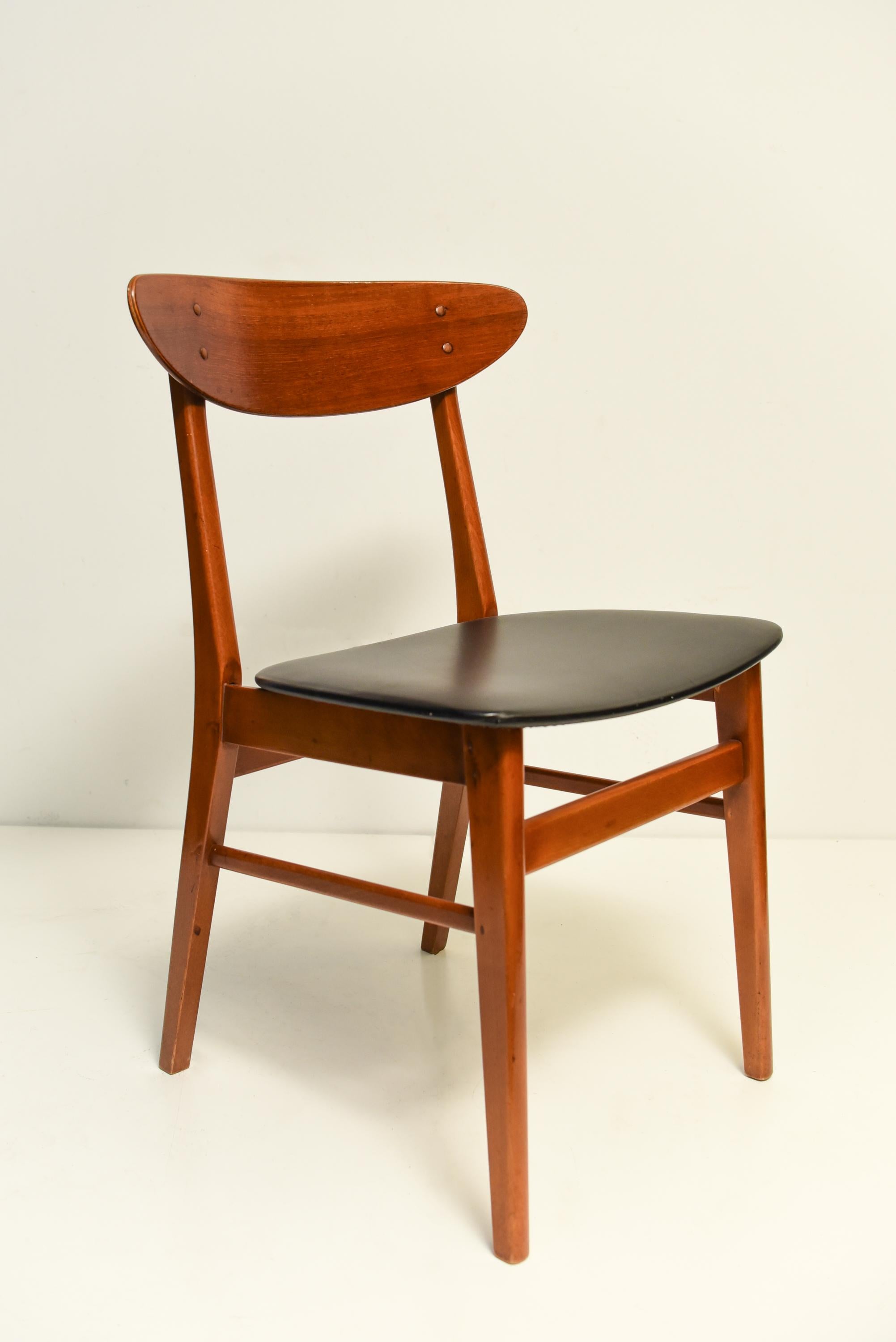 Mid Century Set of eight Scandinavian teak dining chairs, 1960s.