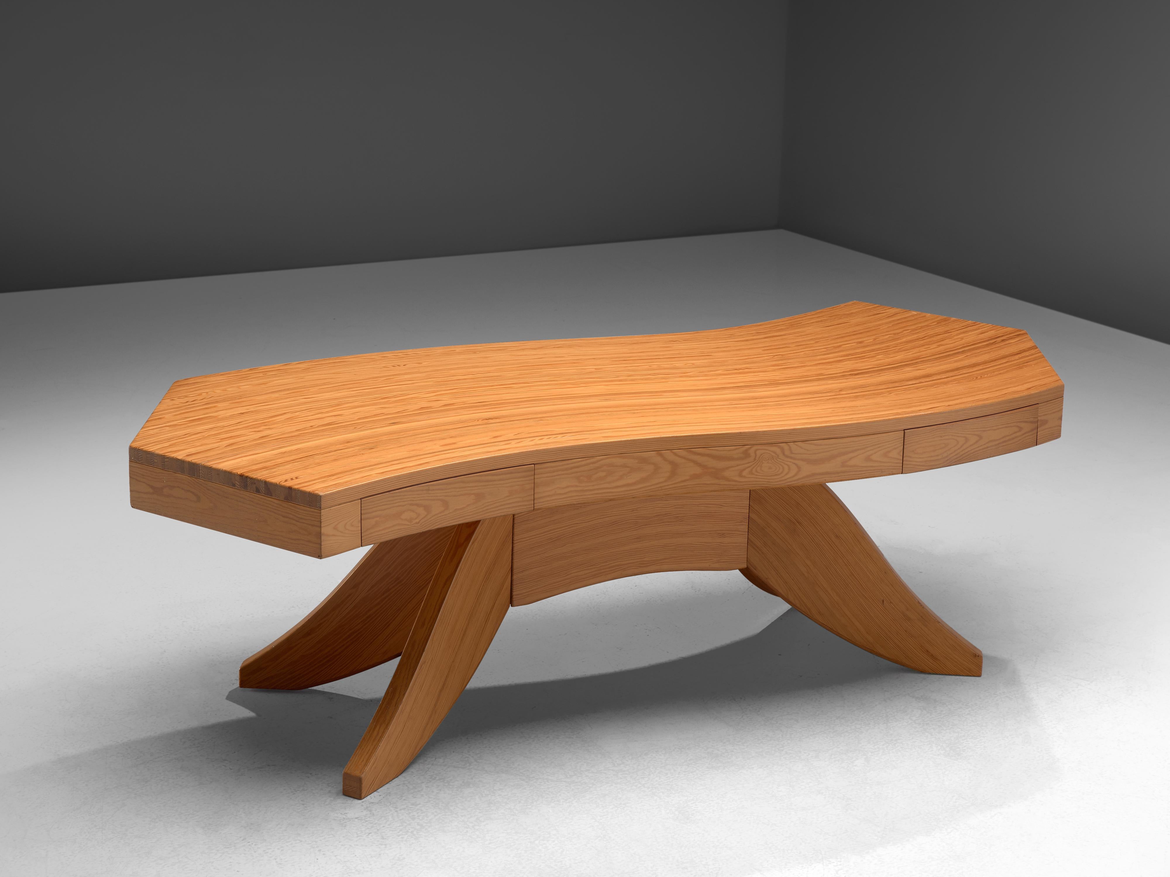 Dining or writing table with drawers, pine, Scandinavia, 1960s

Stunning biomorphic table with a curved tabletop. The table features a waved wooden top. Two drawers are included in the tabletop. The centered leg extends in four feet, that give