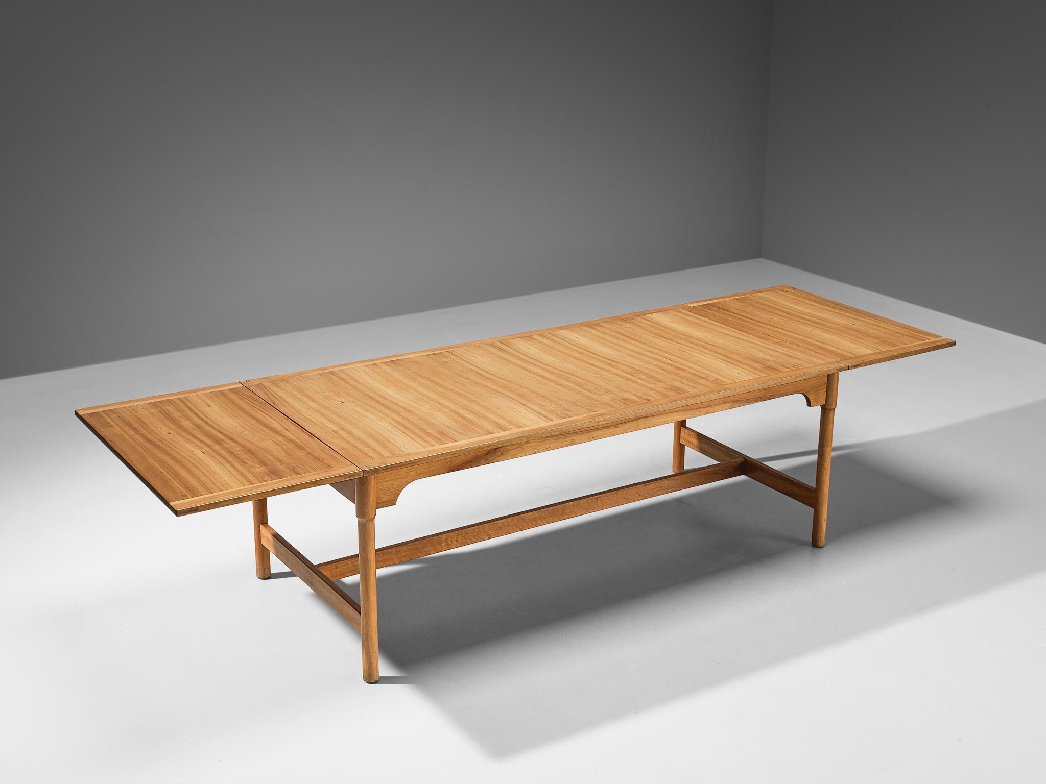 Dining table, walnut, Scandinavia, 1960s

A truly stunning dining table that was made in Scandinavia in 1960s. This piece is made in walnut wood, that has amazing grain and quality to it. What is also remarkable about this table, is the side