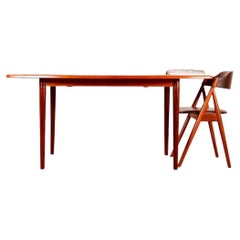 Scandinavian dining table with double extension.