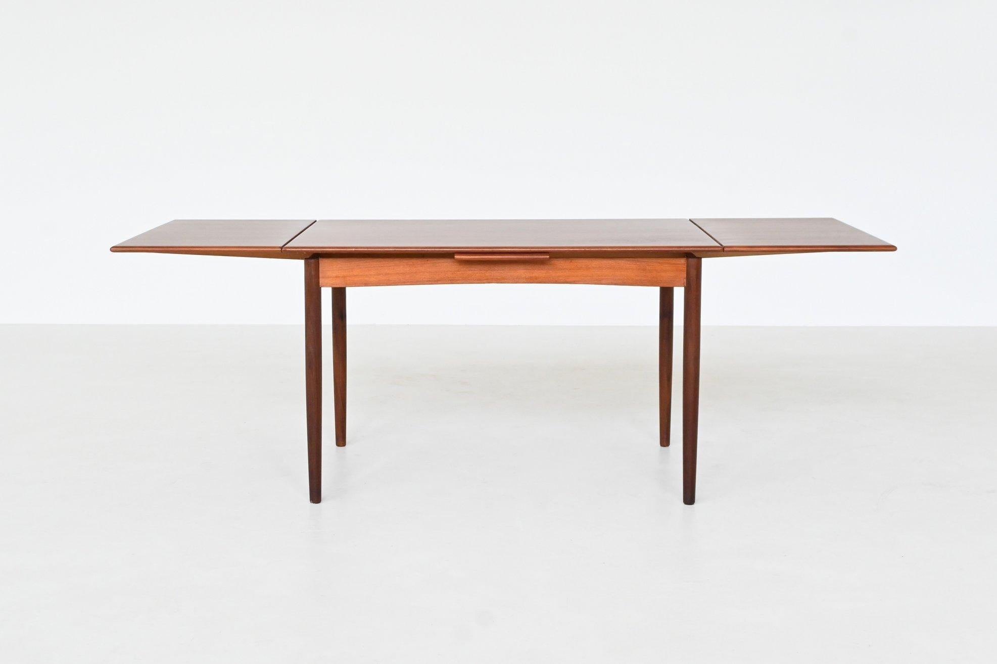 Mesa de comedor extensible escandinava de teca Mediados de siglo Dinamarca 1960 Escandinavo moderno en venta