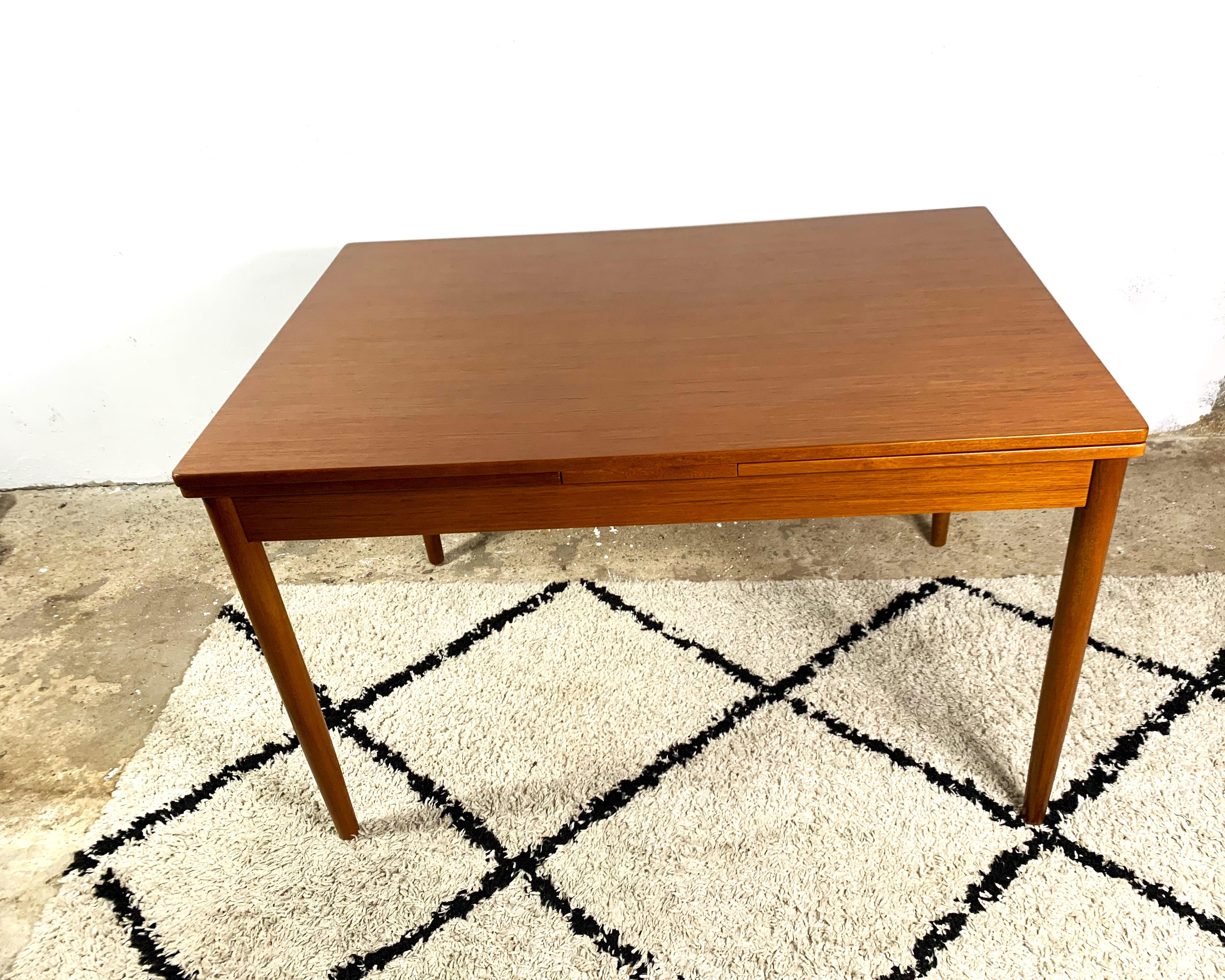 Scandinavian Extending Dining Table From The 1960s, In Teak Veneer. For Sale 6