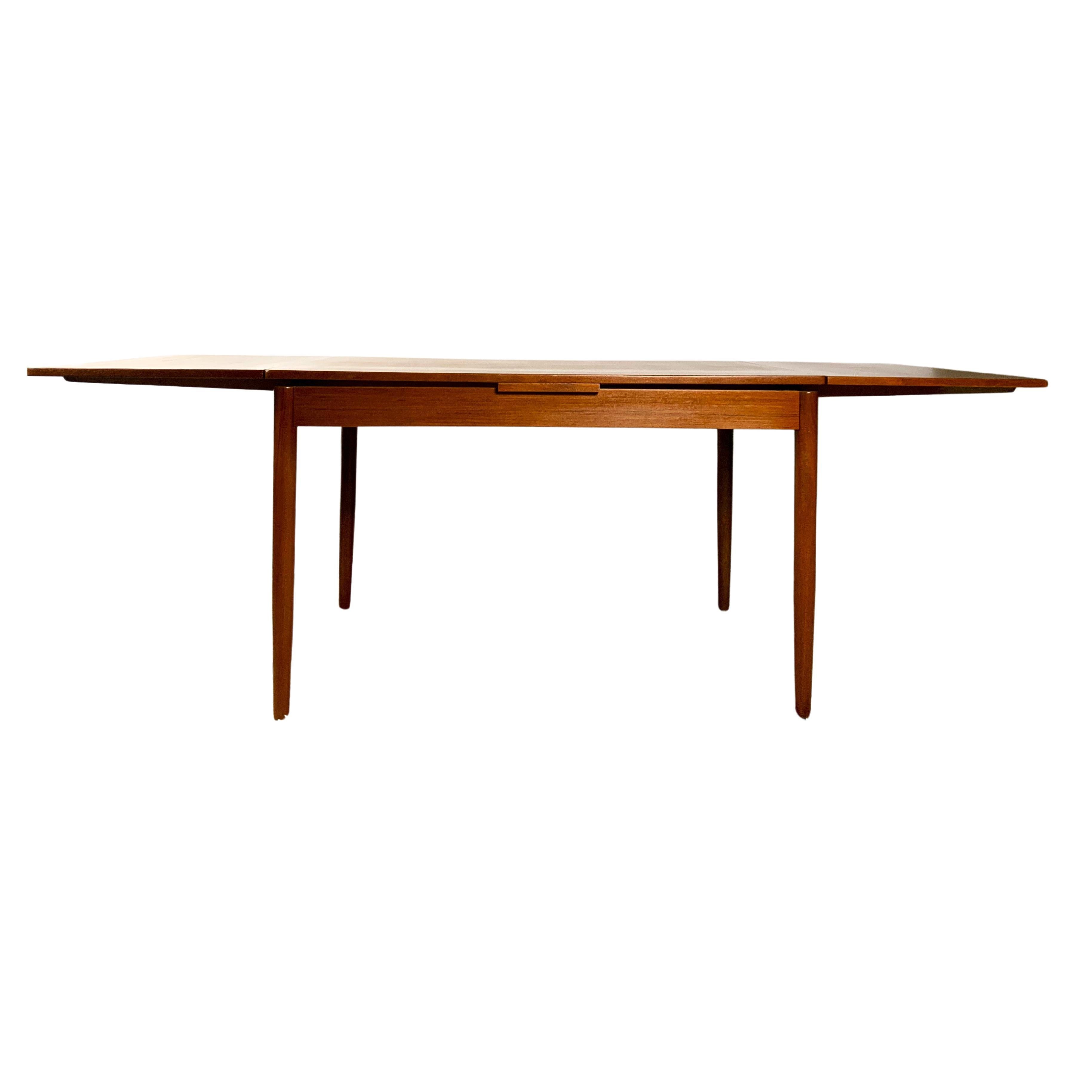 Scandinavian Extending Dining Table From The 1960s, In Teak Veneer.