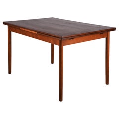 Used Scandinavian extending dining table from the 1960s, in teak veneer. 