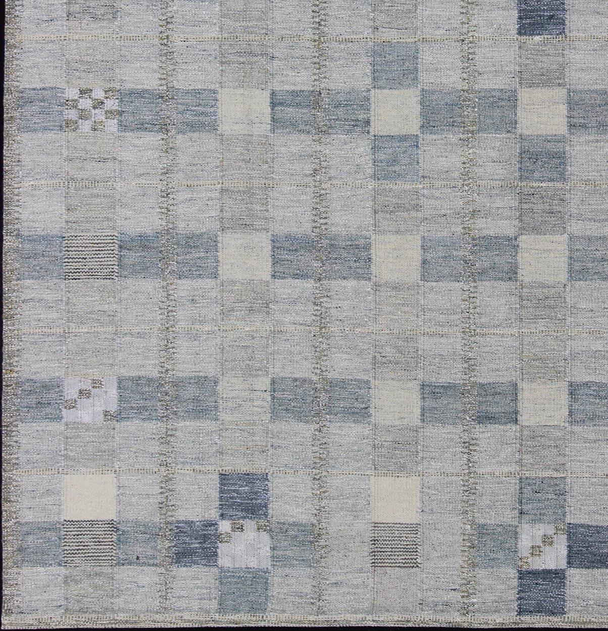 Gray and blue Scandinavian flat-weave design rug with geometric design, rug rjk-18844-shb-137-01, country of origin / type: India / Scandinavian flat-weave.

This Scandinavian flat-weave is inspired by the work of Swedish textile designers of the