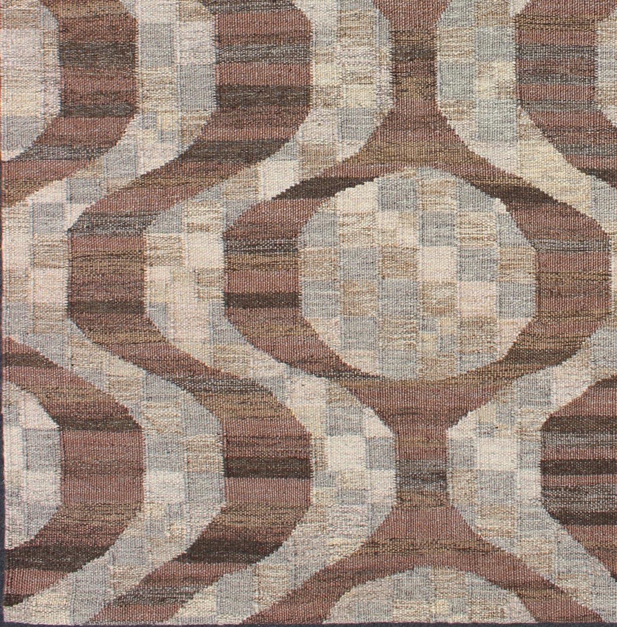 Alfombra moderna de tejido plano en marrón, café, gris y crema Alfombra/RJK-16222-SHB-044-03

Medidas: 6'2 x 8'9.

Esta alfombra escandinava de tejido plano se inspira en el trabajo de los diseñadores textiles suecos de principios a mediados del