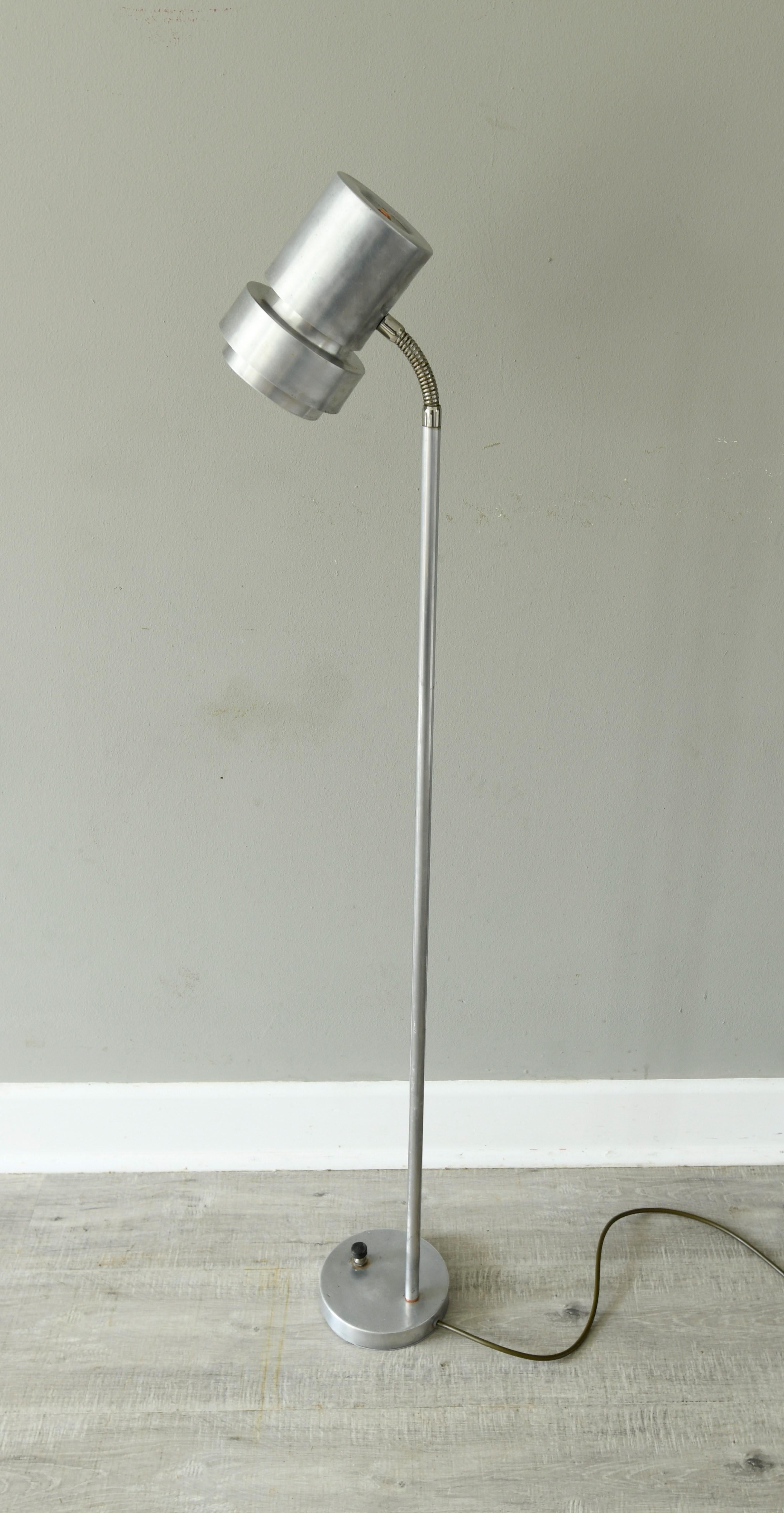 A floor lamp designed and made in Norway by Tr & Co (T. Røste), circa in the second half of the 1960s. The lamp is fully working and makes for a great book reading floor lamp there's pitting to metal which adds to the character of this amazingly